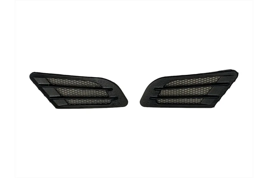 Two black plastic fender duct accessories for 1/10 scale RC car bodies, featuring a mesh grille design.
