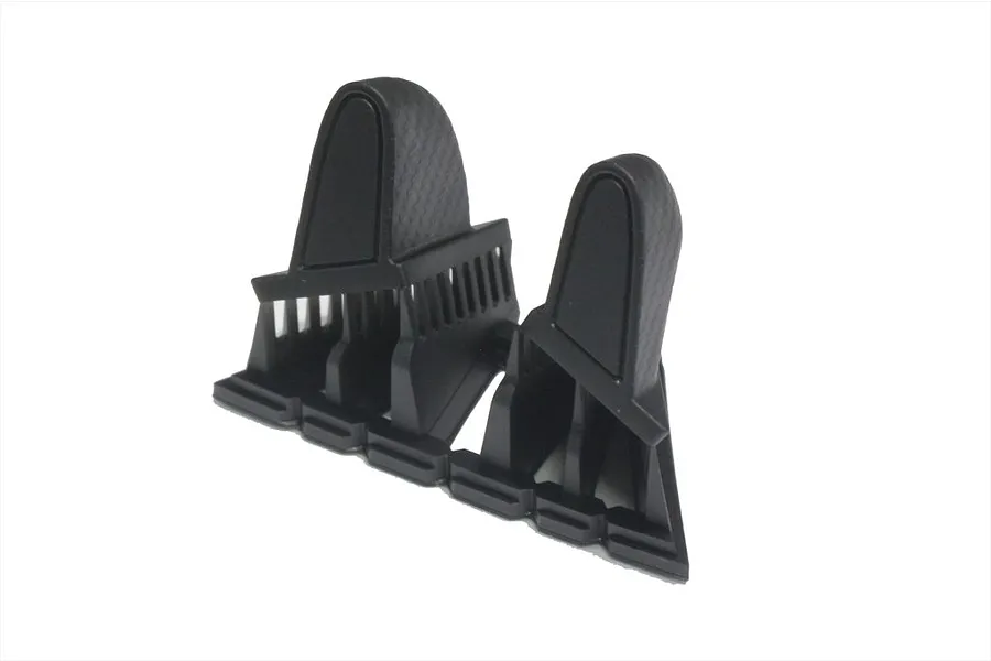 Two black carbon-style aero door mirrors for 1/10 scale RC cars, shown from a side angle against a white background.