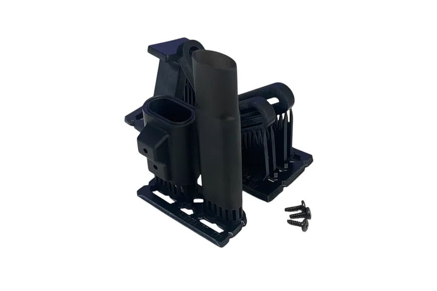 A black plastic RC car over muffler accessory with mounting brackets and small screws on a white background.