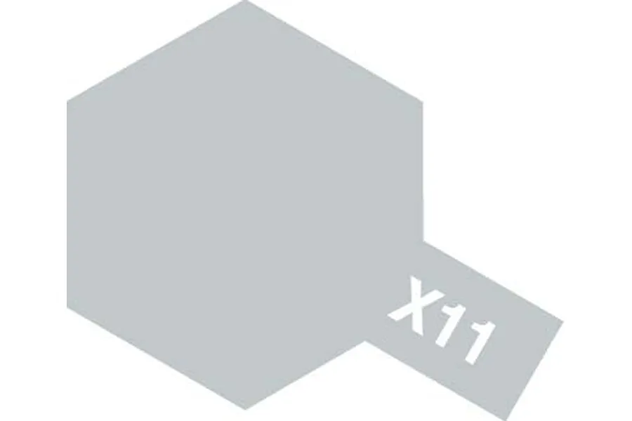 A graphic icon representing Tamiya X-11 paint, featuring a light grey hexagon shape with a small rectangular tab extending from the bottom right containing the text X11.