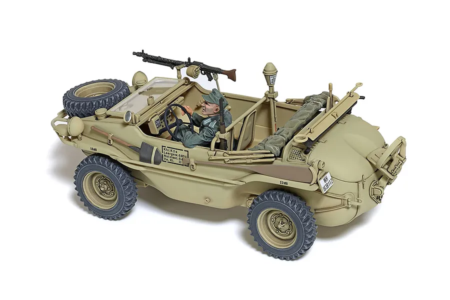 A 1/35 scale Tamiya model of a German Schwimmwagen T166 with wide wheels, painted in desert tan with a driver figure and mounted machine gun.