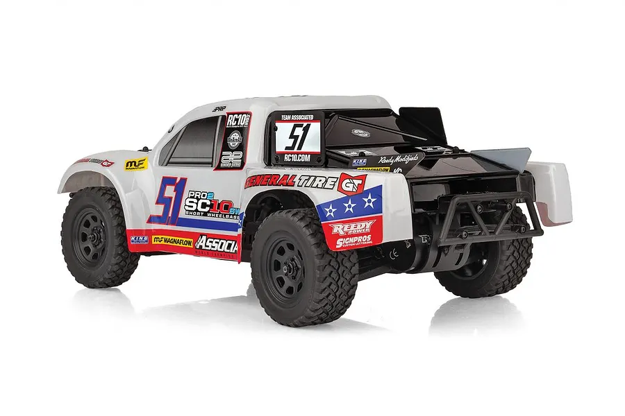 Rear three-quarter view of a white Team Associated Pro2 SC10sw RC short course truck with black wheels and racing decals on a white background.