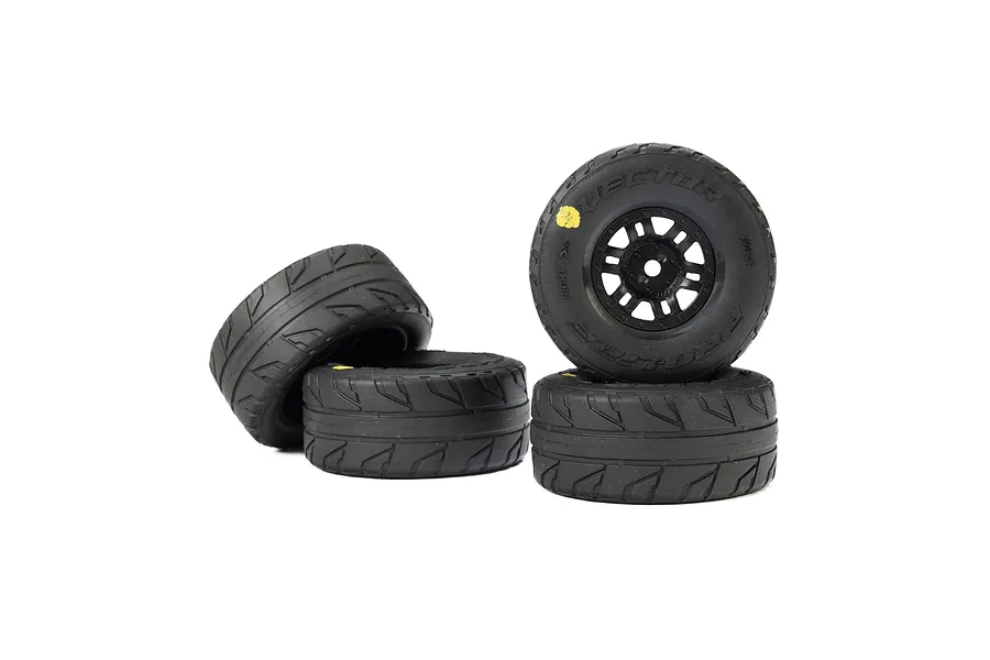 Four Pro-Line Vector RC car wheels with black split-six rims and treaded rubber tyres, arranged in a small stack against a white background.
