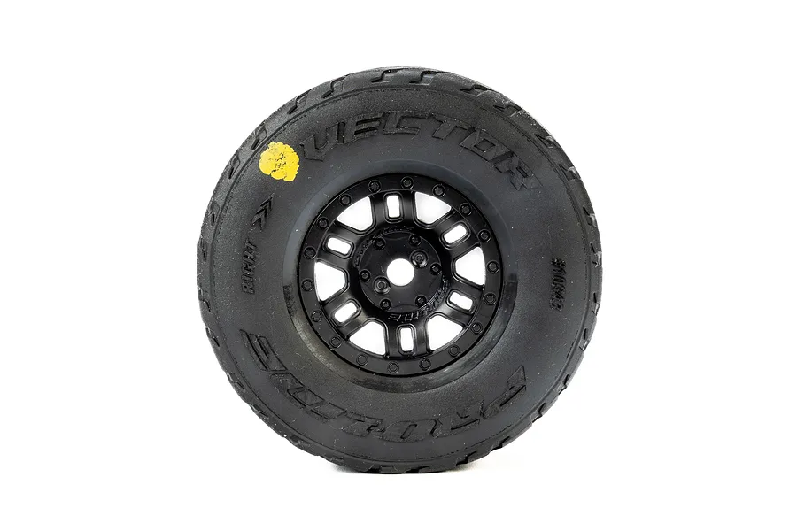 A single Pro-Line Vector RC tyre mounted on a black split-six rim, viewed from the side against a white background.