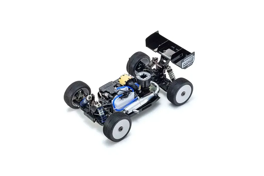 High-angle studio shot of a Kyosho Inferno MP11 1/8 scale nitro RC buggy chassis without a body shell, showing the engine, exhaust, and suspension.