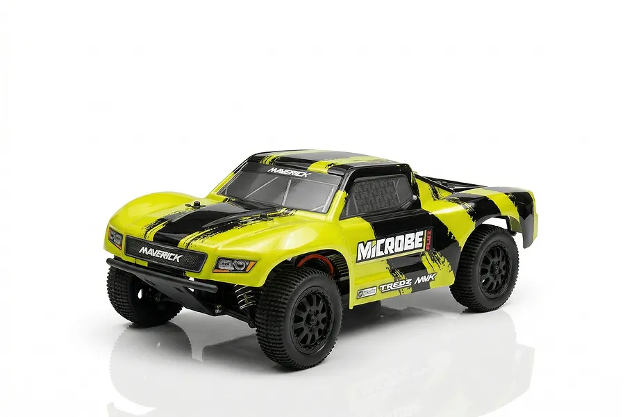 A studio shot of the Maverick MiCROBE SC Flux 1/24 scale RC short course truck in yellow and black, viewed from a front three-quarter angle.