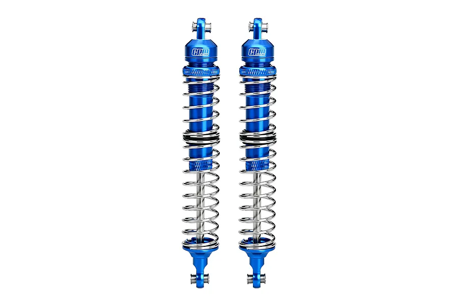 Two blue GPM Racing aluminium adjustable double spring RC shock absorbers standing vertically against a white background.
