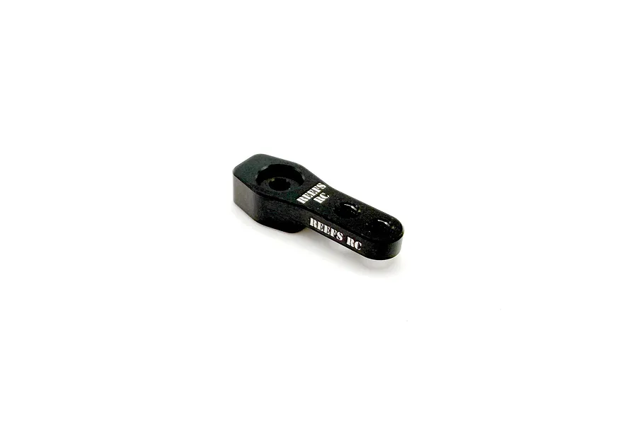 A black Reefs RC Pro Sub Micro servo horn with white branding on a white background.