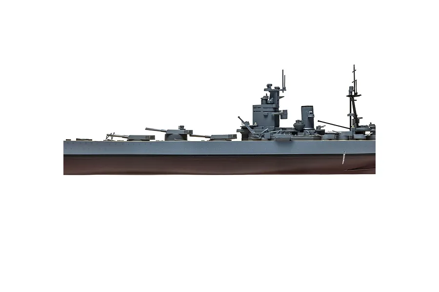A side profile view of a detailed scale model of the HMS Nelson battleship, showing the grey superstructure and dark red hull against a white background.