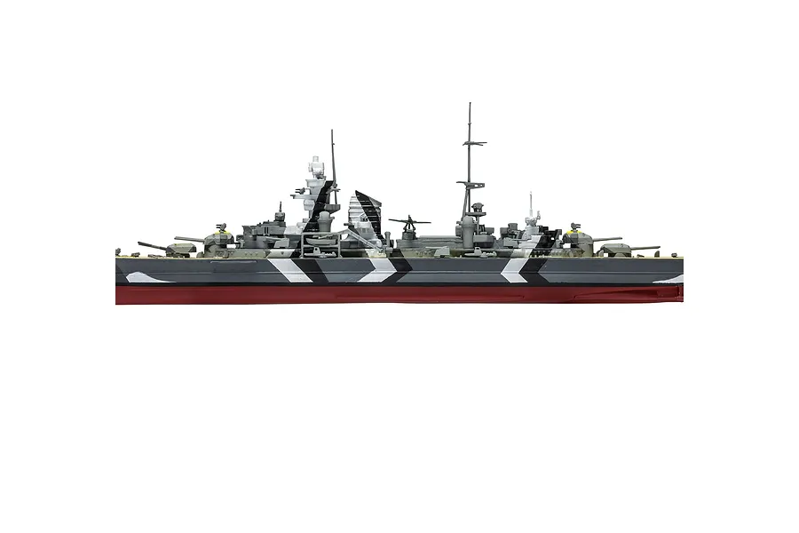 A side profile view of a fully assembled and painted 1/600 scale plastic model of the Prinz Eugen heavy cruiser with a distinctive black and white dazzle camouflage.