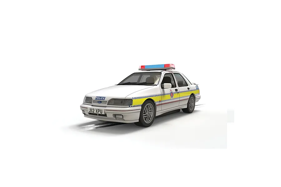 A 1/32 scale Scalextric Ford Sierra Sapphire Essex Police slot car in white with blue and yellow police livery on a white background.