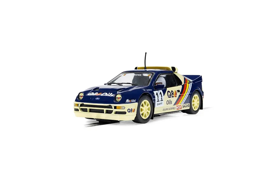 A 1/32 scale Scalextric Ford RS200 slot car in blue and cream livery with Q8 Oils branding and number 11 on the side.