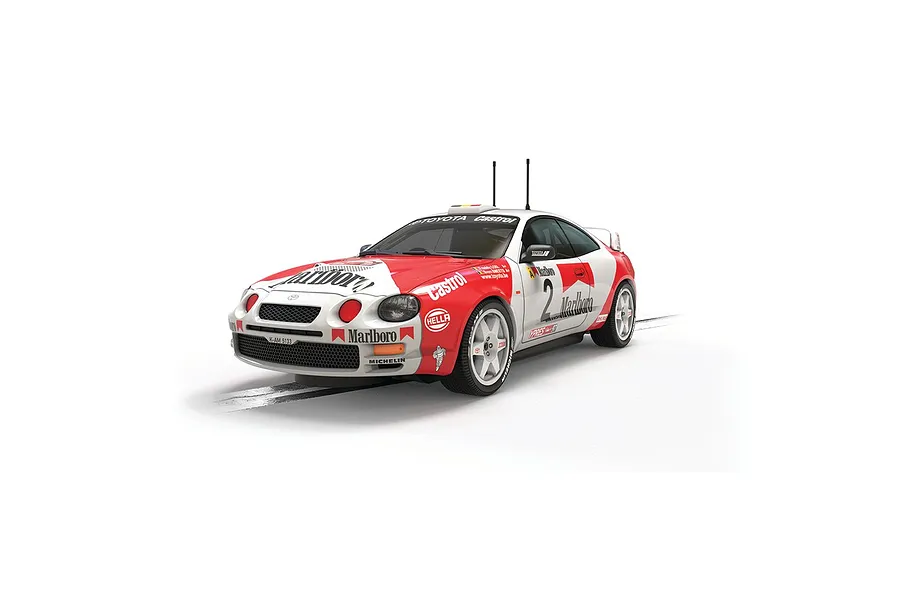 Scalextric 1/32 scale 1997 Toyota Celica GT-Four rally slot car in white and red Marlboro livery with number 2 on the side.