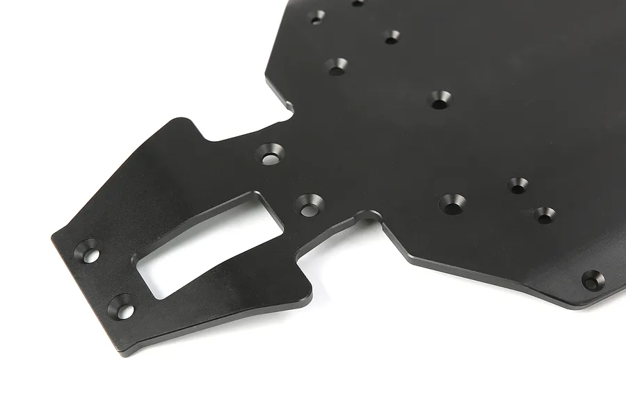 A black anodized aluminium RC car main chassis plate shown from an angled top-down perspective against a white background.