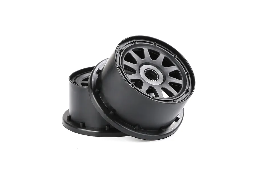 Two black Rovan 1/5 scale short course rear rims stacked against each other on a white background.