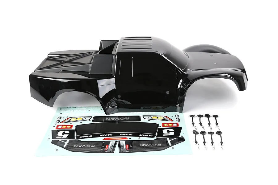 A glossy black Rovan 1/5 scale 5SC short course RC truck body shell with a decal sheet and body clips on a white background.