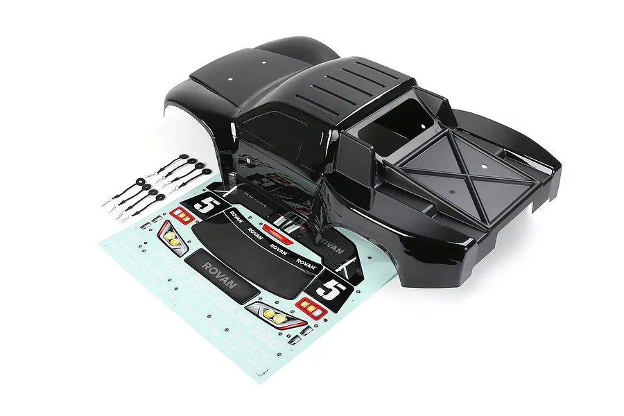 A black Rovan 1/5 scale 5SC short course RC truck body shell with a decal sheet and body clips on a white background.