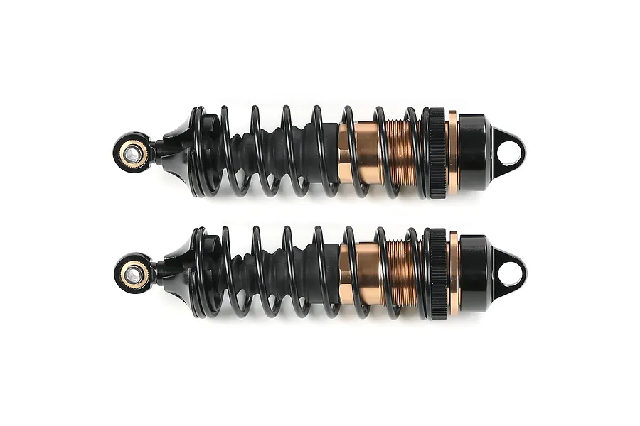 Two Rovan aluminium adjustable RC shock absorbers in bronze and black finish, shown side-by-side against a white background.