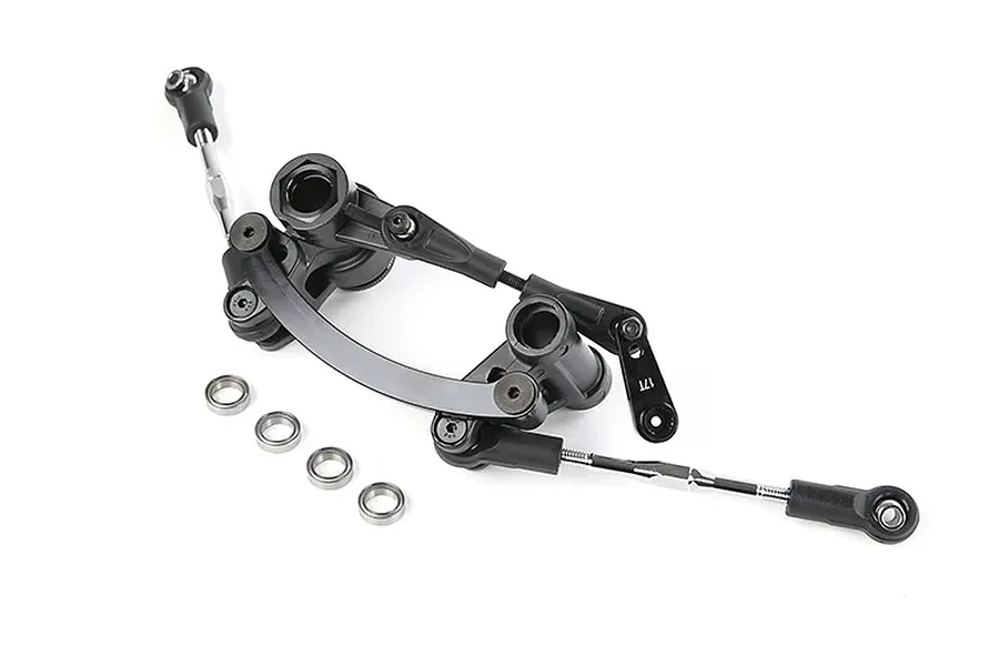 Rovan black aluminium steering bell crank and drag link assembly with four small metal bearings on a white background.