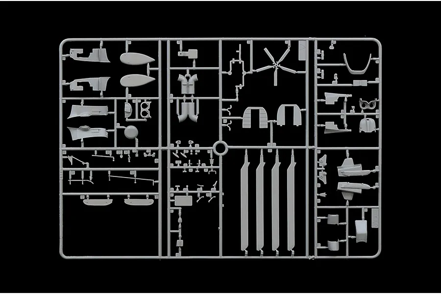 A grey plastic sprue containing various model helicopter parts for an Italeri 1/72 scale AS332 Super Puma kit, isolated against a black background.