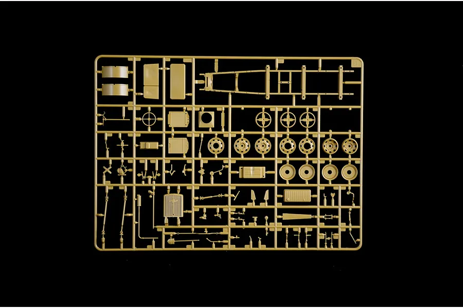 A tan plastic sprue containing various parts for an Italeri 1/35 scale Opel Blitz truck model kit, set against a black background.