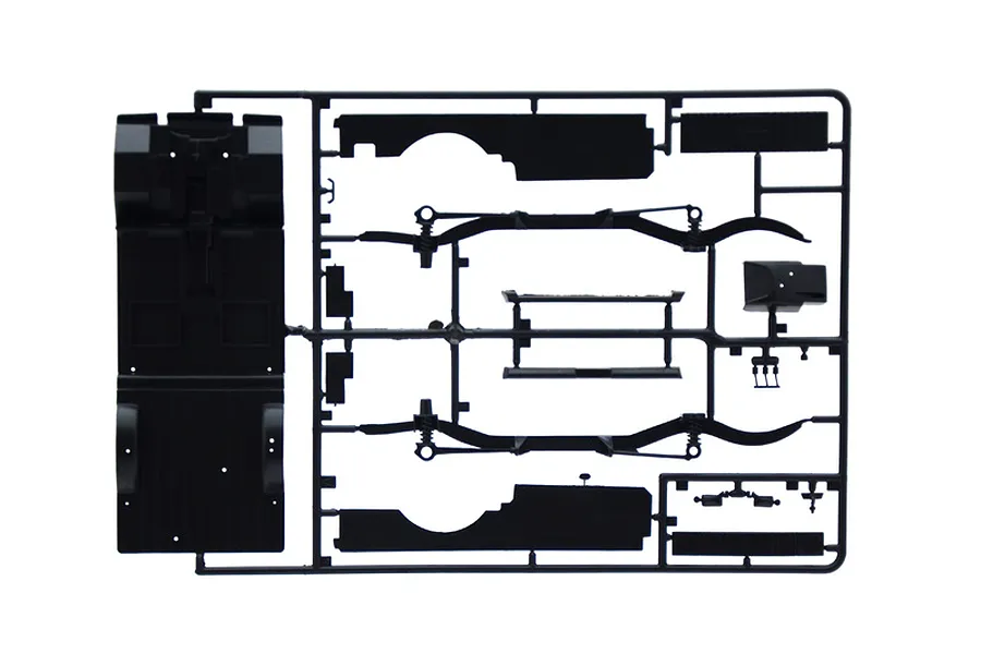 A black plastic model kit sprue containing chassis and floor pan components for a 1/24 scale model car.