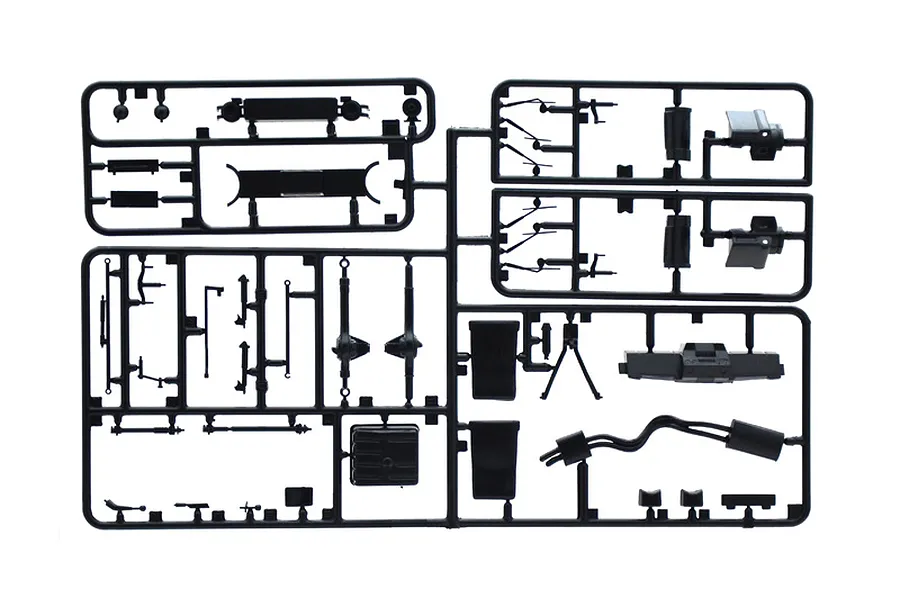 A black plastic sprue containing various unpainted model car parts for an Italeri 1/24 scale Range Rover model kit.