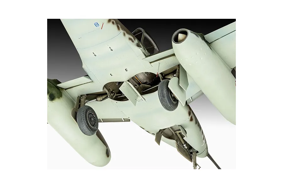Underside view of a 1/32 scale Messerschmitt Me262 model aircraft showing landing gear, engine nacelles, and camouflage paint scheme.