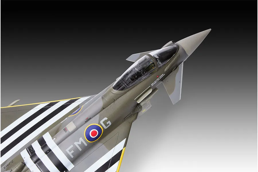 A high-angle close-up of a finished 1/48 scale Revell Eurofighter Typhoon model, featuring RAF markings and invasion stripes on a grey background.