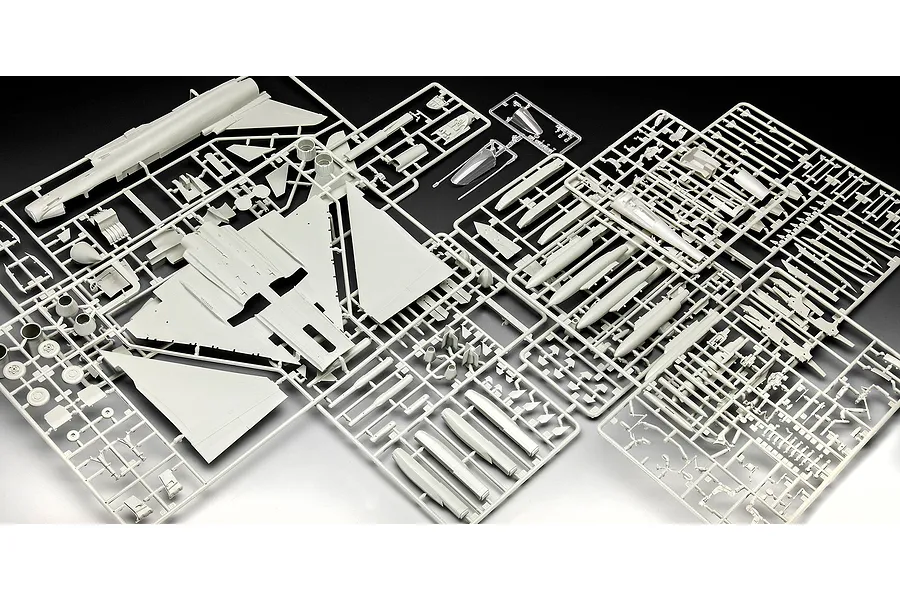 Several grey plastic model kit sprues containing parts for a 1/48 scale Eurofighter Typhoon jet fighter, laid out on a black background.