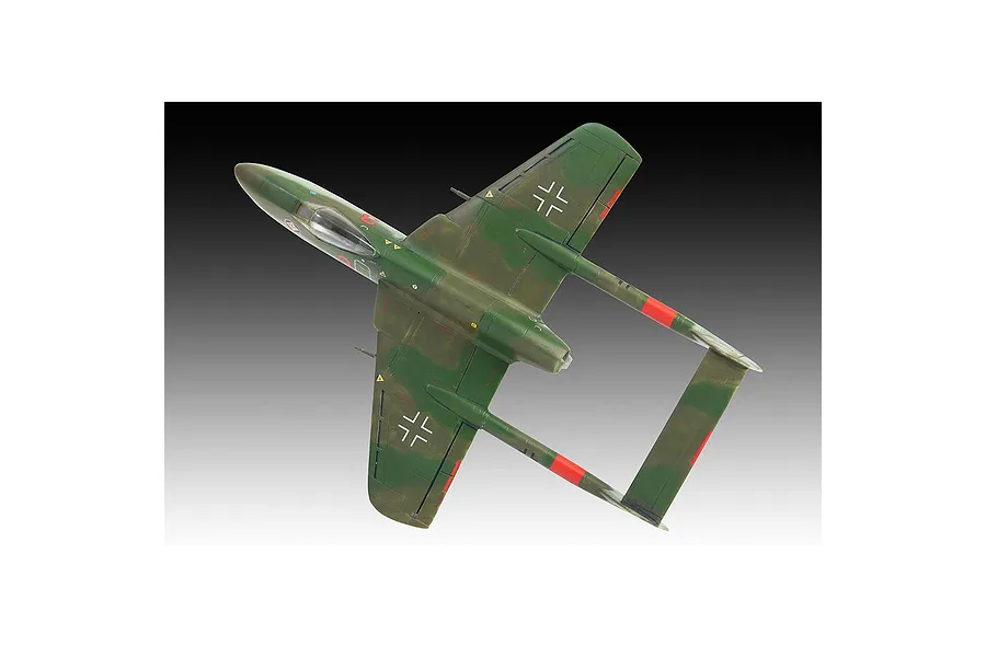 A top-down view of a completed 1/72 scale Focke-Wulf Flitzer plastic model aircraft, painted in green camouflage with red accents and German cross markings.