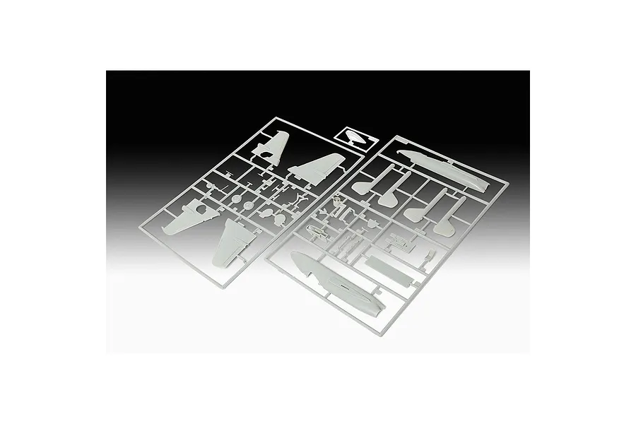Two grey plastic model kit sprues containing aircraft parts for a Focke Wulf Flitzer model, displayed against a black and white gradient background.