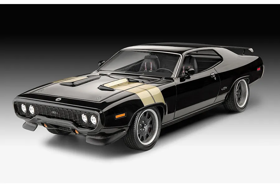 A 1/24 scale plastic model of a black 1971 Plymouth GTX from Fast &amp; Furious, featuring gold hood stripes and custom wheels.