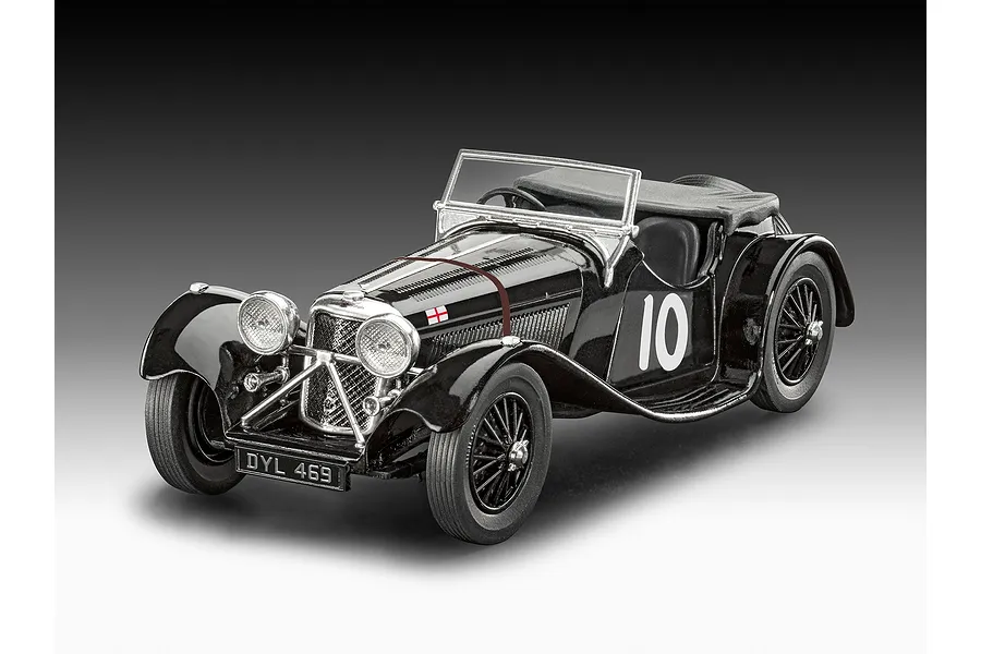A studio shot of a completed black Revell 1/32 scale Jaguar SS 100 model car with the number 10 on the side and a DYL 469 license plate.