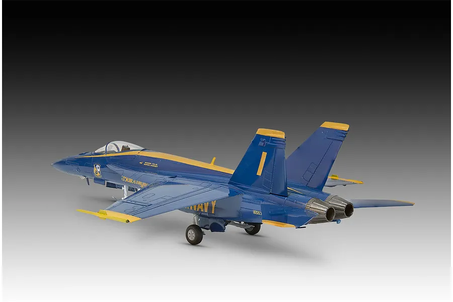 A completed 1/72 scale plastic model of a US Navy Blue Angels F/A-18 Super Hornet jet, viewed from the rear three-quarter angle.
