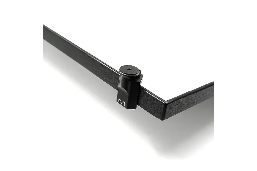 Close-up of a black aluminium level board corner piece with the Yeah Racing logo, set against a white background.
