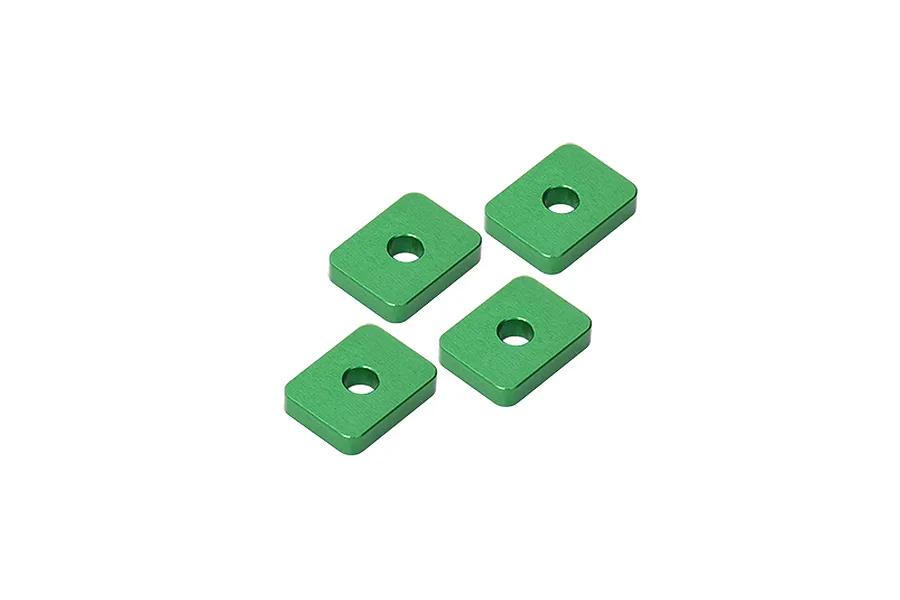 Four small, rectangular green anodized aluminium spacers with a central hole, arranged on a white background.
