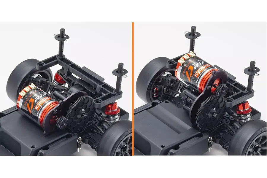 Close-up of the rear motor mount and drivetrain assembly on a Kyosho Fazer D2 RC drift car chassis, showing two different motor mounting positions.
