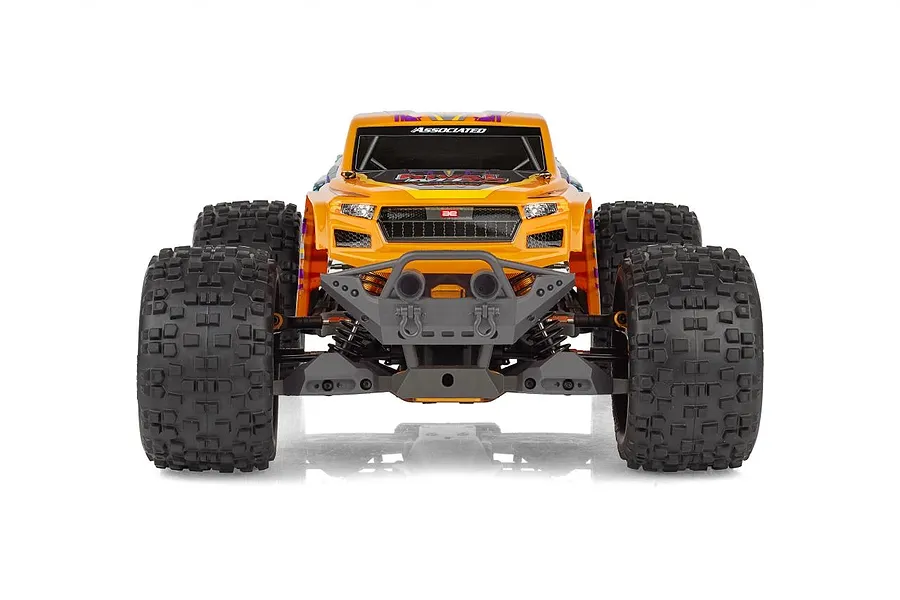 Front view of the Team Associated Rival MT10 Factory Team RC monster truck with an orange body shell and large off-road tires.