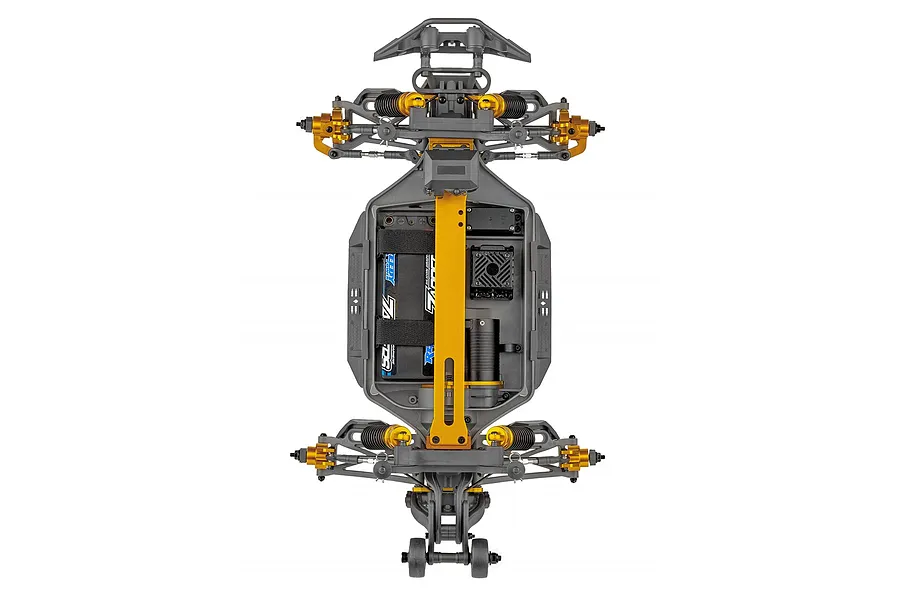 Top-down view of the Team Associated Rival MT10 Factory Team chassis showing the central gold anodized brace, battery, motor, and suspension components.