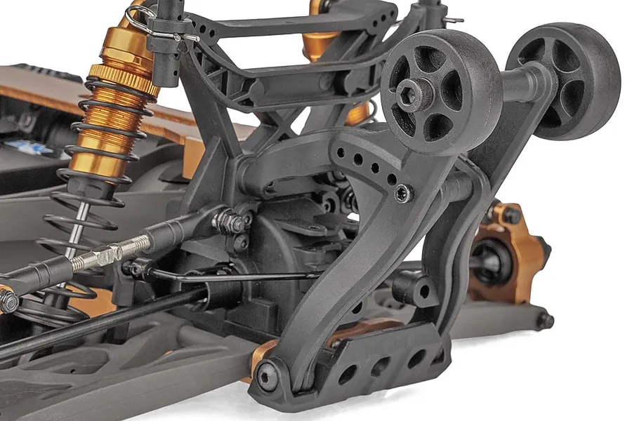 Close-up of the rear suspension and wheelie bar assembly on a Team Associated Rival MT10 RC monster truck chassis.
