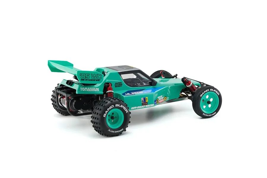 A studio shot of the Kyosho Tomahawk '85 WC Worlds Spec RC buggy, featuring a teal body, rear wing, and off-road tires on a white background.