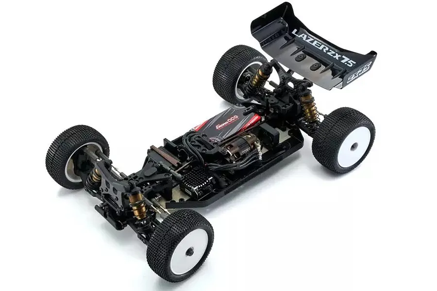 High-angle studio shot of a Kyosho Lazer ZX7.5 1/10 scale 4WD electric RC buggy chassis with electronics installed.
