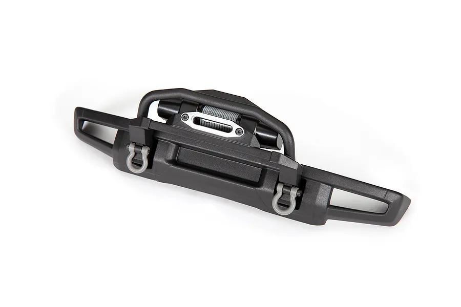 A black Traxxas RC front bumper with an integrated winch and two grey D-ring shackles, isolated on a white background.