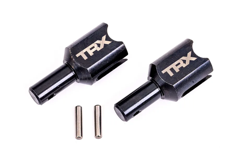 Two black hardened steel Traxxas differential output cups with TRX branding and two small metal pins on a white background.