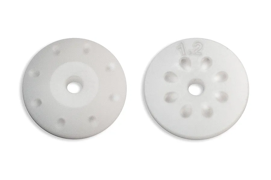 Two white Factory Team 16mm shock pistons with 8 holes, featuring a tapered design and 1.2mm hole size markings.