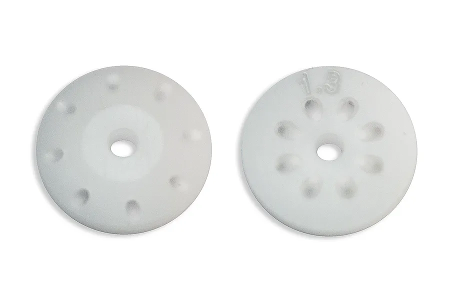 Two white Factory Team 16mm tapered shock pistons with 8 holes, showing both sides of the component.
