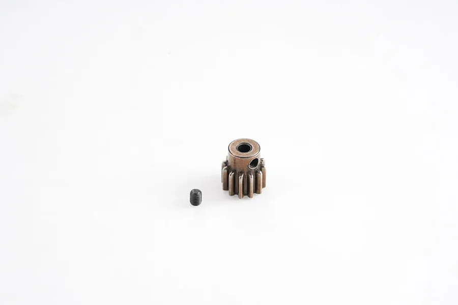 A 12-tooth metal pinion gear and a small black grub screw isolated on a white background.