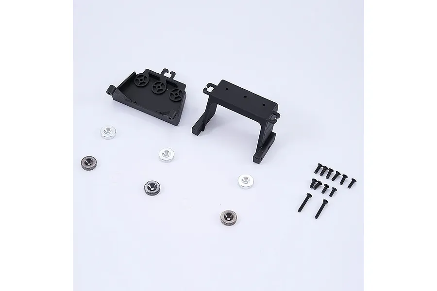 FMS LED control unit mount set including two black plastic brackets, several metal washers, and a set of small black screws.