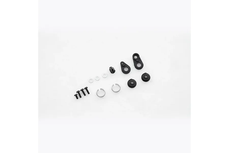 FMS V2 Servo Saver Set components including black plastic arms, metal screws, washers, and springs on a white background.